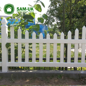 4 foot scalloped vinyl picket fence on uneven ground